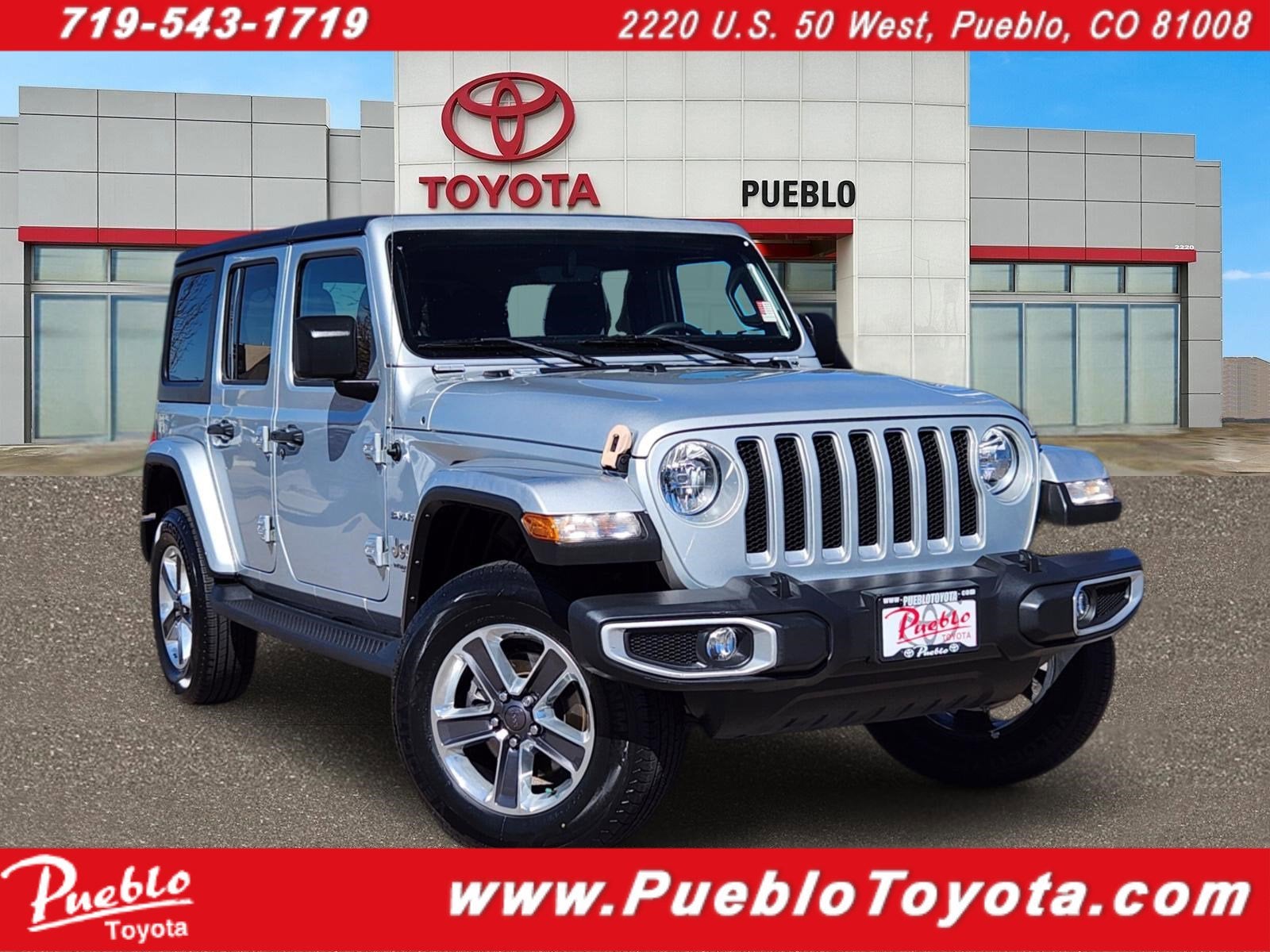 2022 Jeep Wrangler Unlimited Sahara in Silver Zynith Clearcoat — front three-quarter view