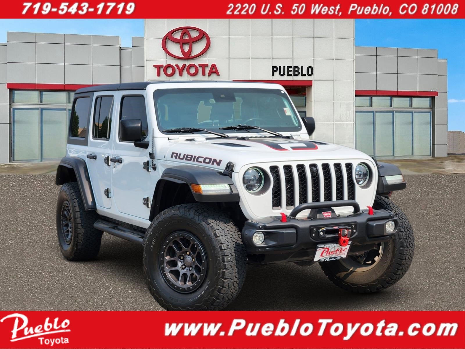 2023 Jeep Wrangler Rubicon in Bright White Clearcoat — front three-quarter view