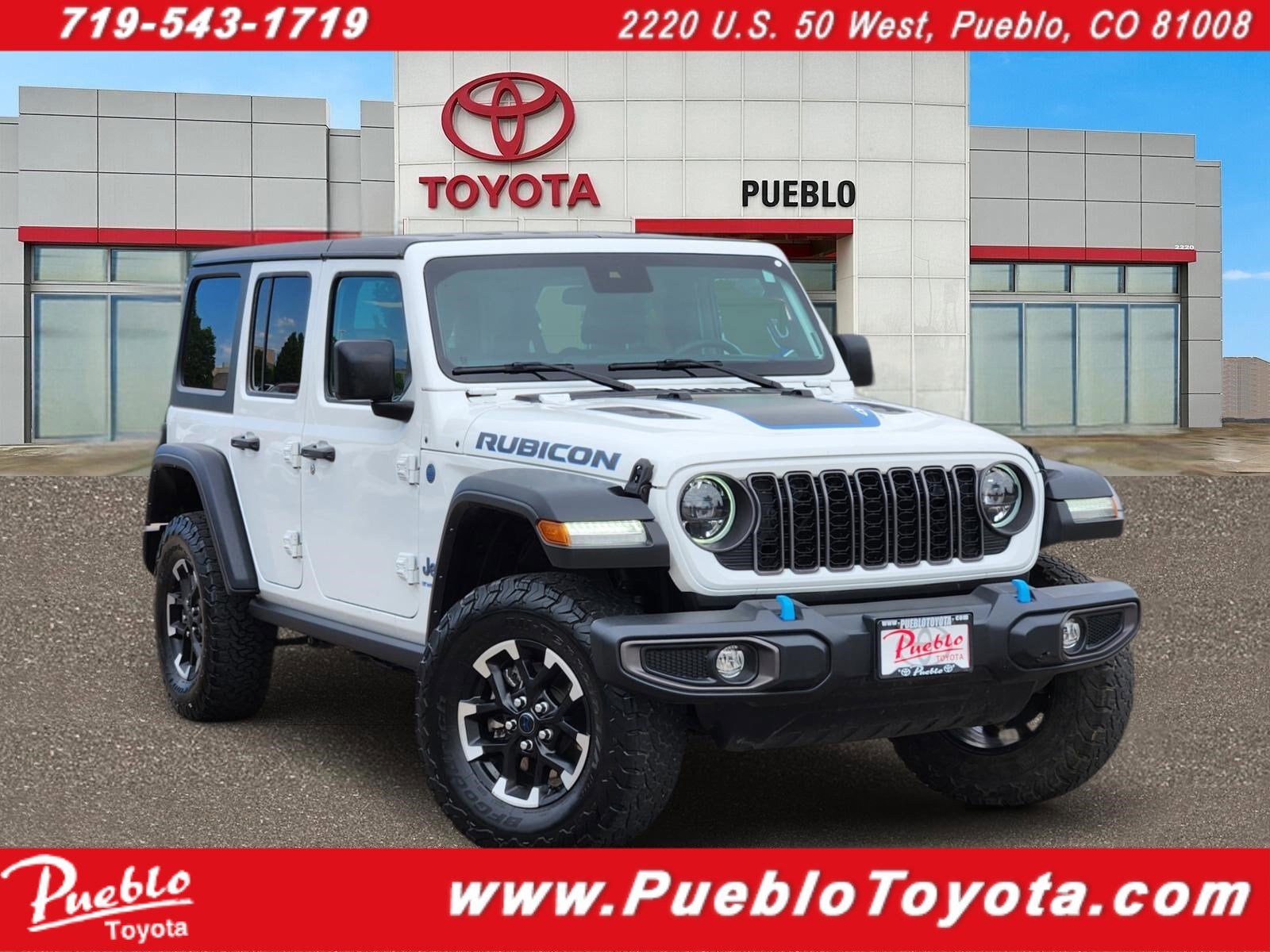 2024 Jeep Wrangler 4xe Rubicon in Bright White Clearcoat — front three-quarter view