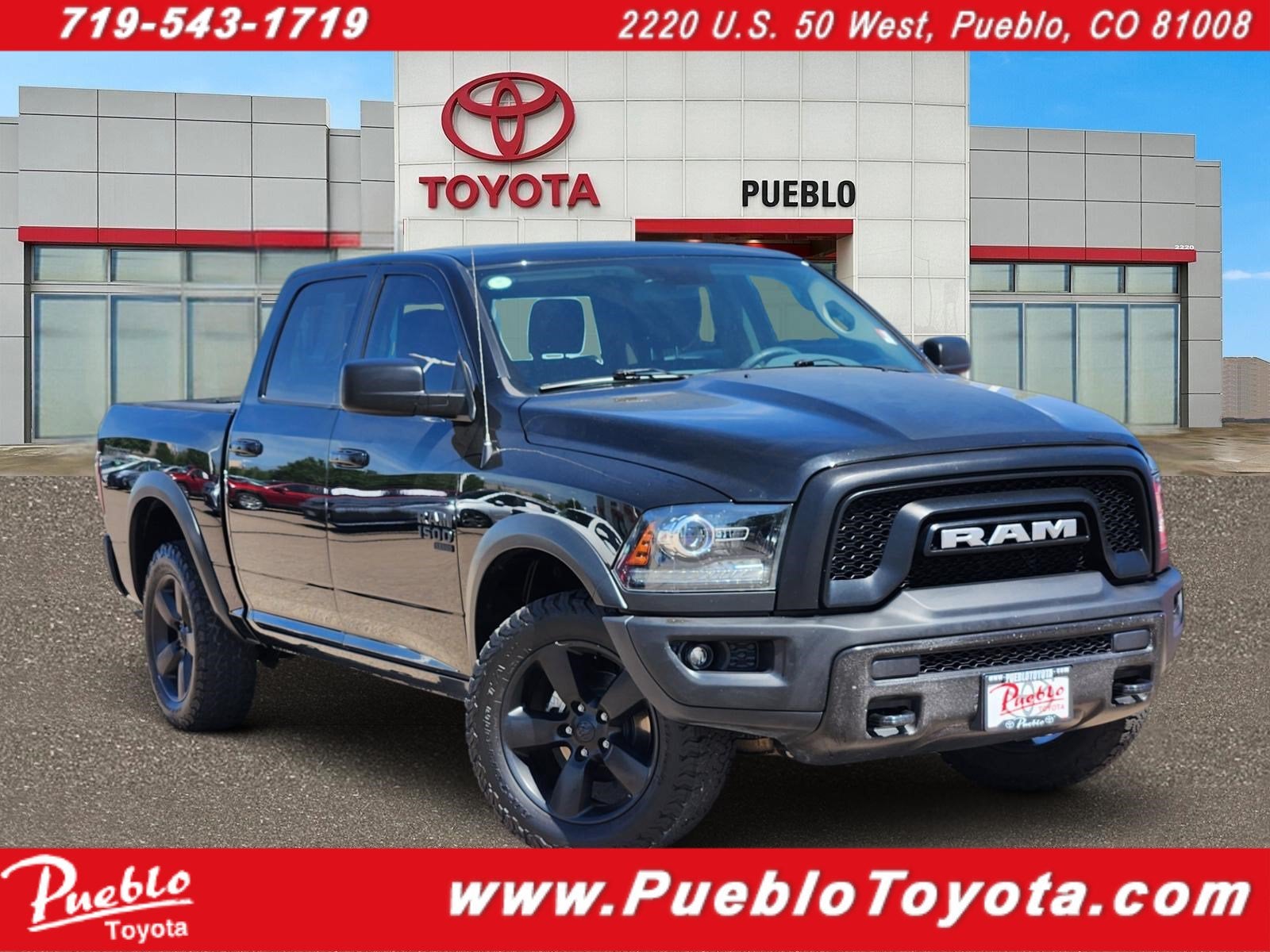 2019 RAM 1500 Classic Warlock in Diamond Black Crystal Pearlcoat — front three-quarter view