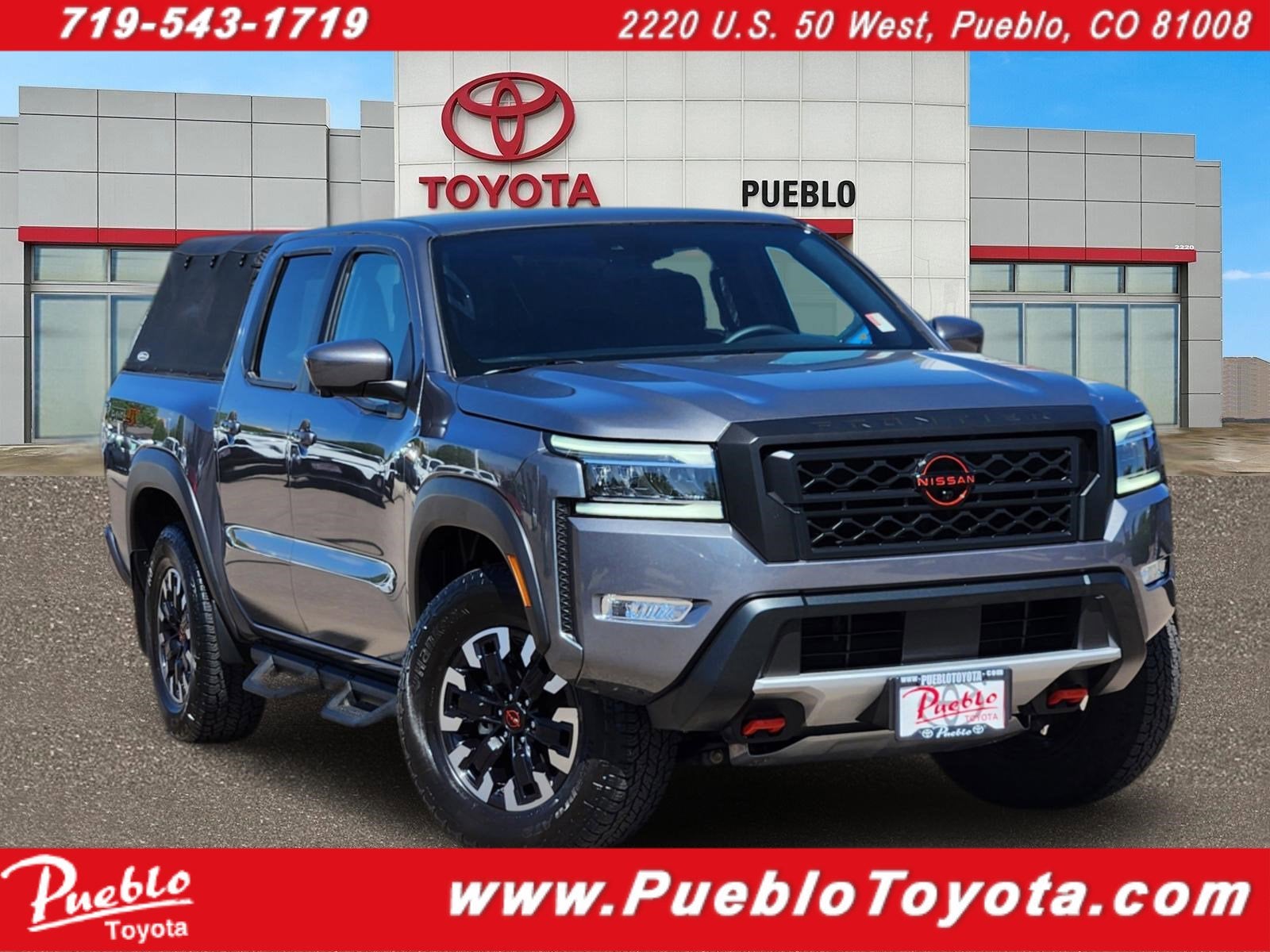 2024 Nissan Frontier PRO-4X in Gun Metallic — front three-quarter view