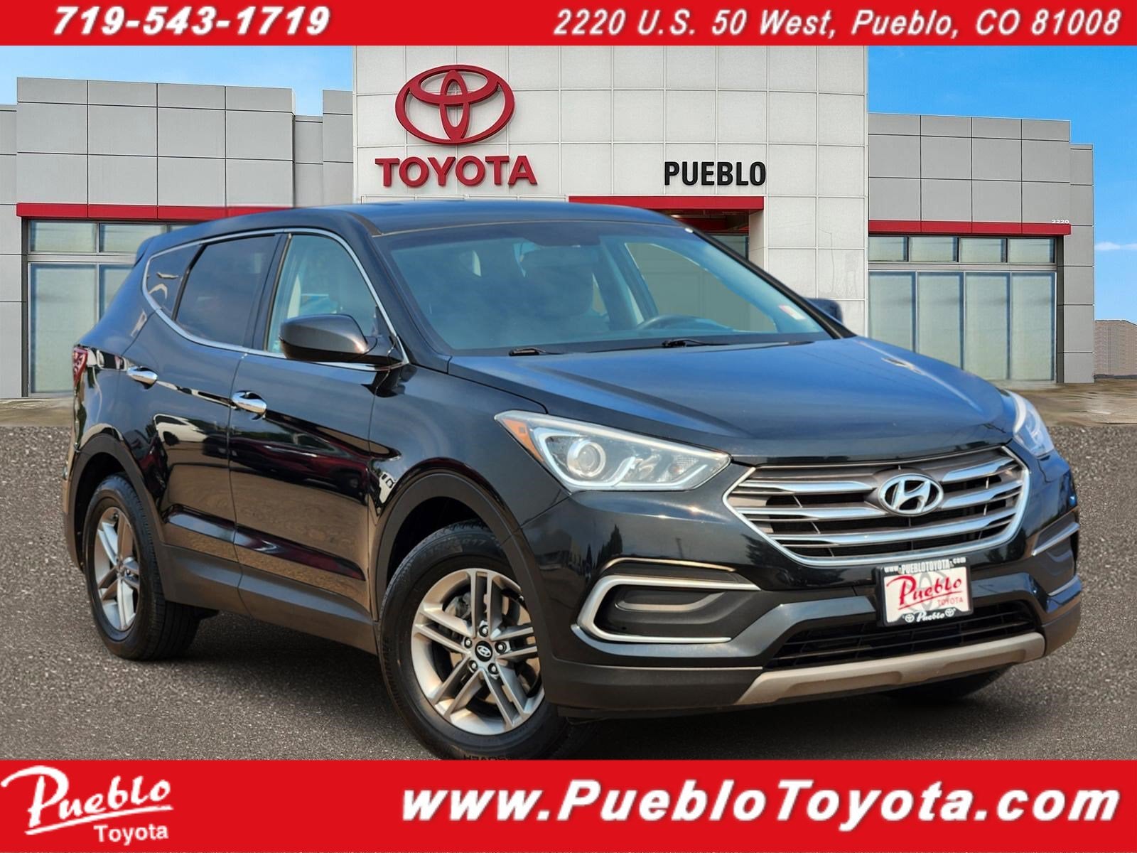 2018 Hyundai Santa Fe Sport 2.4L in Twilight Black — front three-quarter view