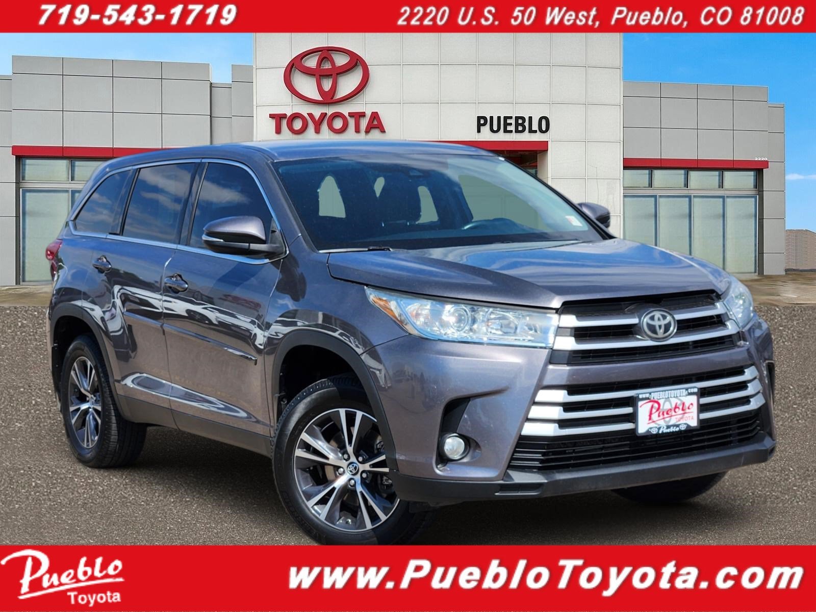 2019 Toyota Highlander LE Plus in Predawn Gray Mica — front three-quarter view