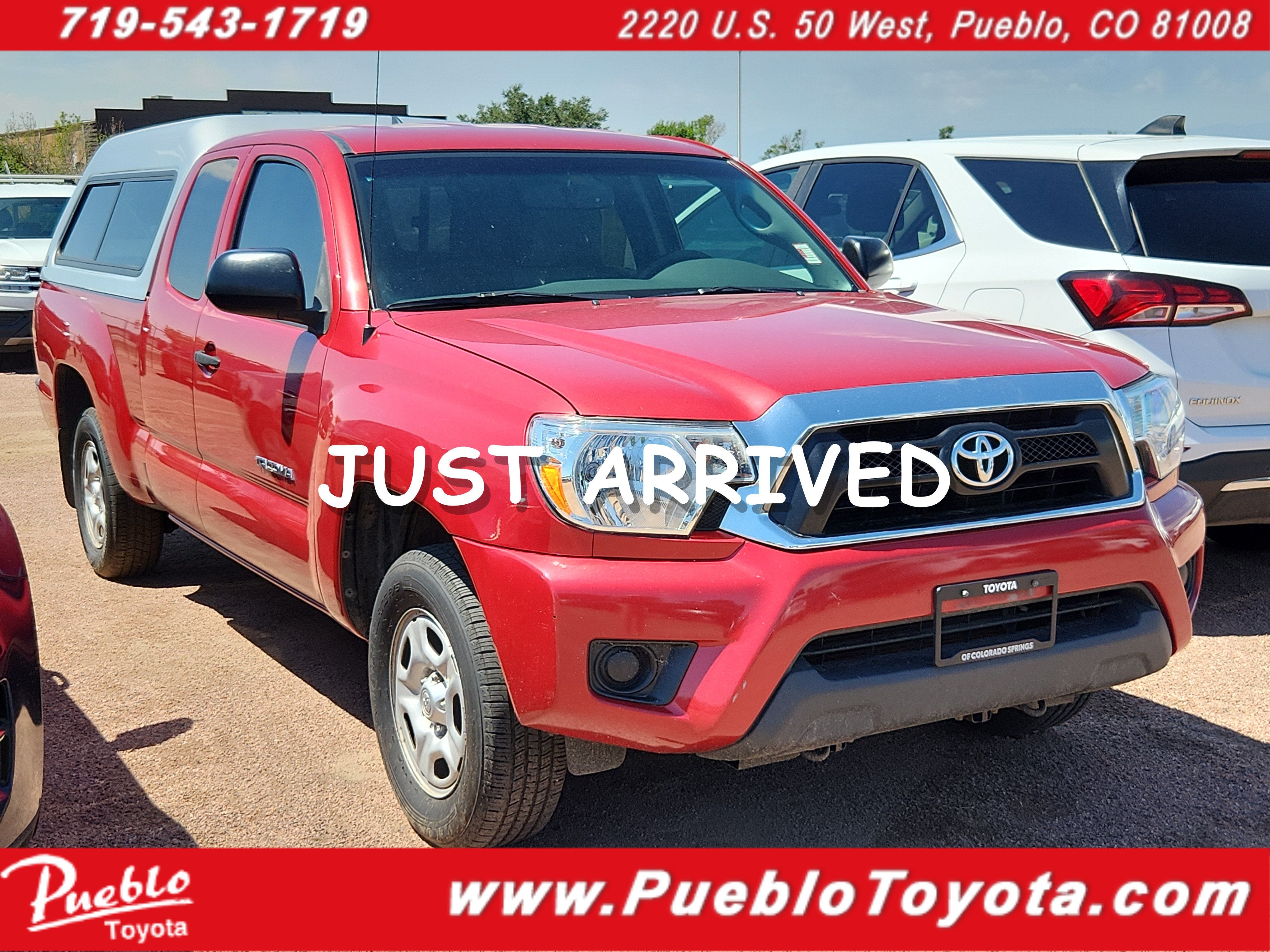 2012 Toyota Tacoma PK in Red — front three-quarter view