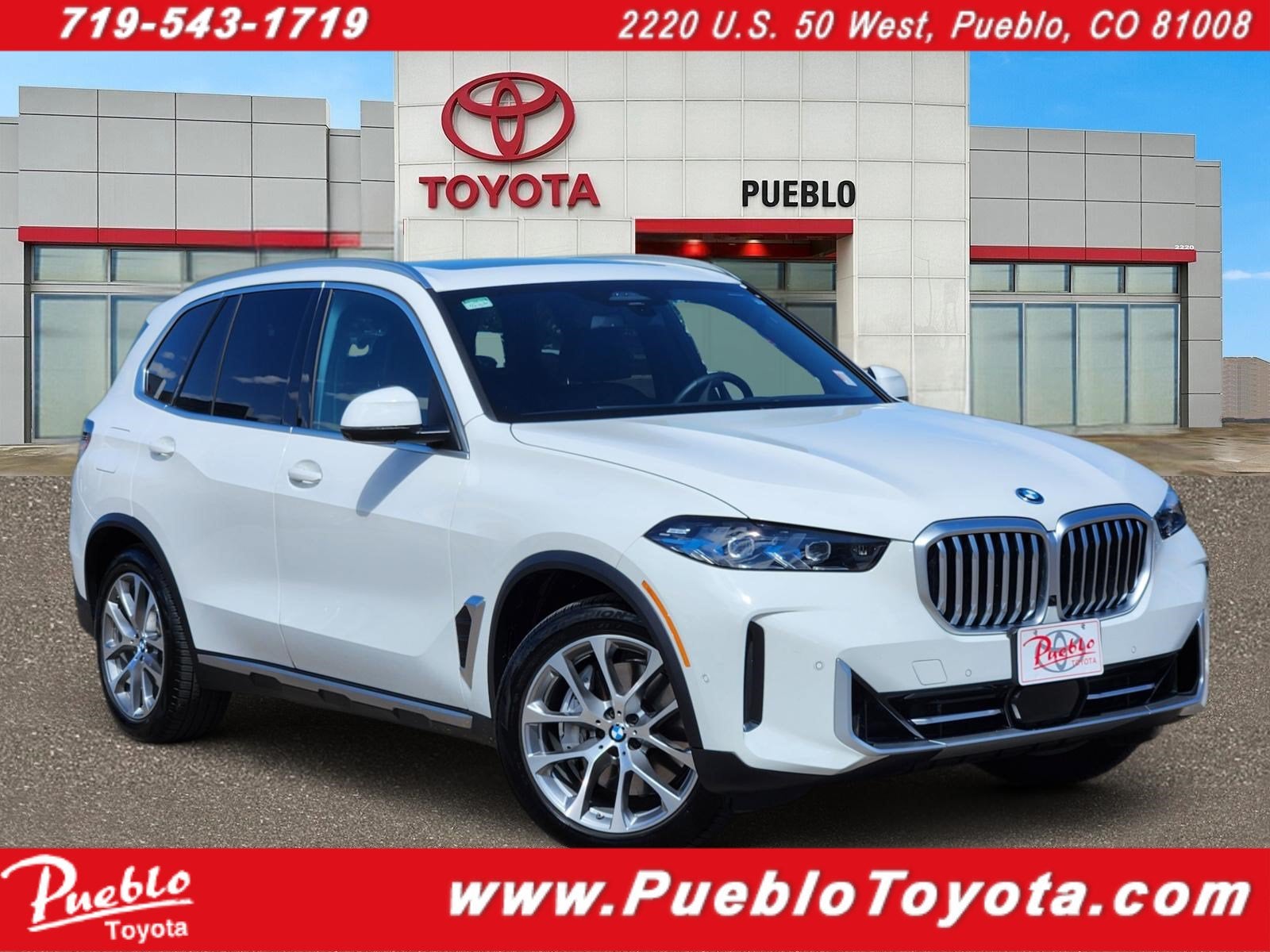 2026 BMW X5 xDrive50e in Alpine White — front three-quarter view
