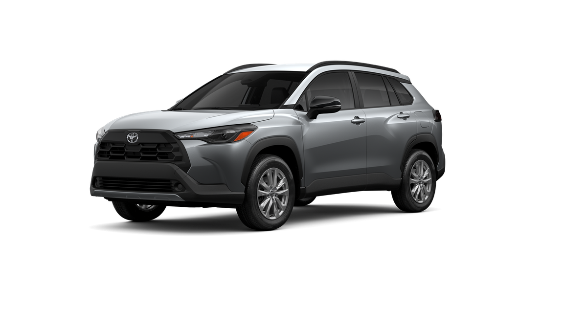 2026 Toyota Corolla Cross LE in Sonic Silver — front three-quarter view